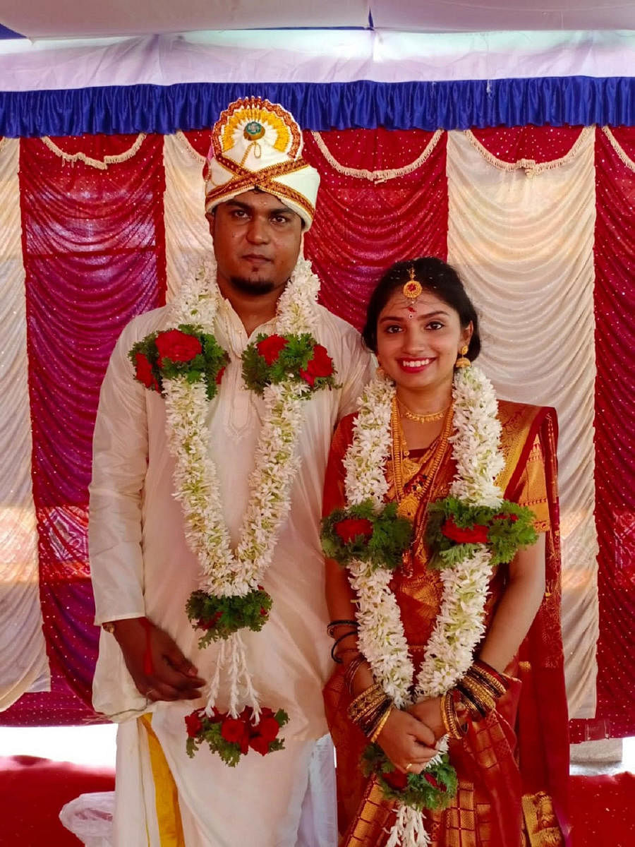 Sanup Nair and Spandana Rai who entered into wedlock in a simple function in Bhagamandala on Sunday. DH Photo