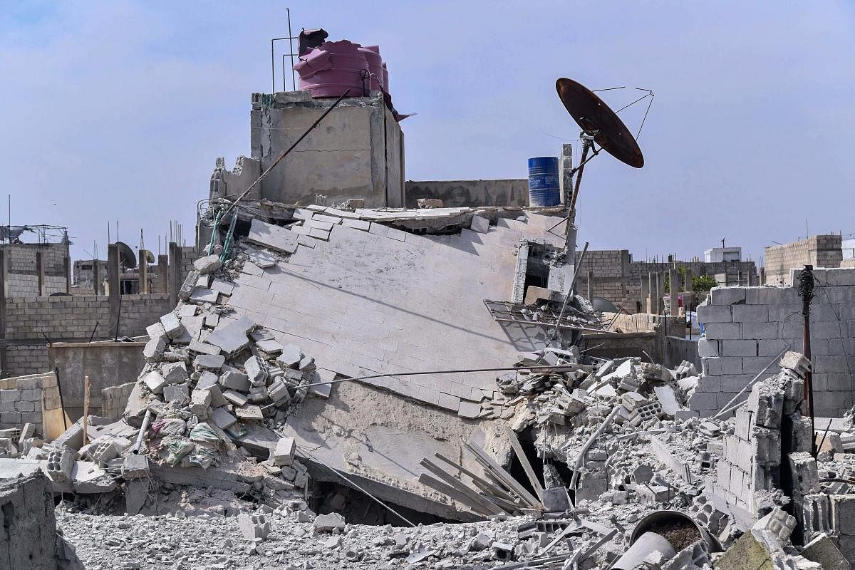 This photo released by the Syrian official news agency SANA, shows the rubble of a house that according to the Syrian authorities was attacked by an Israeli airstrike, in the Damascus suburbs of Hajira, Syria, Monday, April 27, 2020. Credit: AP Photo