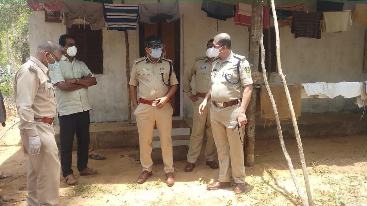 Mulki-Moodbidri MLA Umanath Kotian and Mangaluru Commissioner of Police Dr P S Harsha inspect the scene where a couple was murdered by their neighbour in Yelinje in Mulky police station limits.