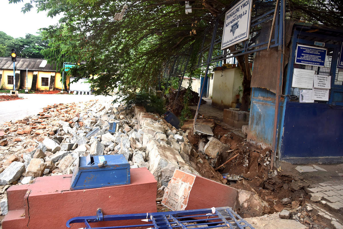Tunbridge High School compound wall is collapse due to heavy rain and Tender SURE work at Infantry Road in Bengaluru on Wednesday, 29 April 2020. Photo by S K Dinesh