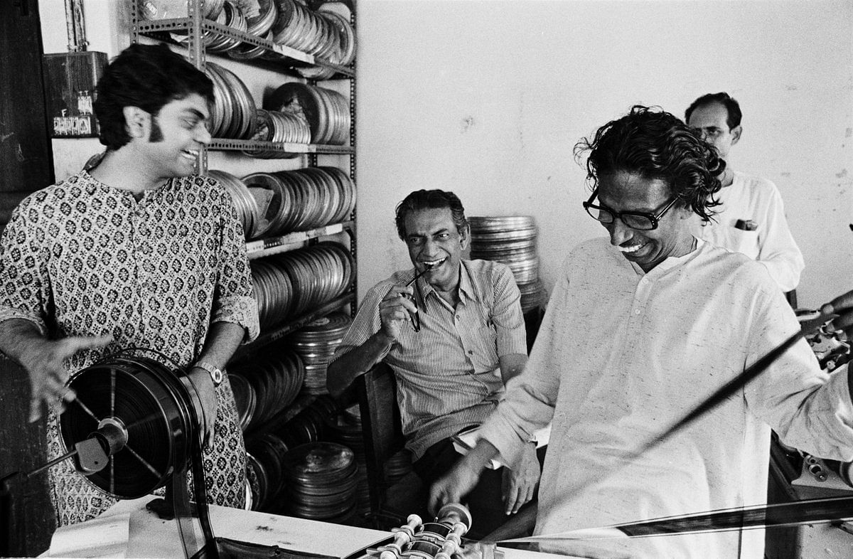 Satyajit Ray (centre) during the editing a film. Credit: Mubi