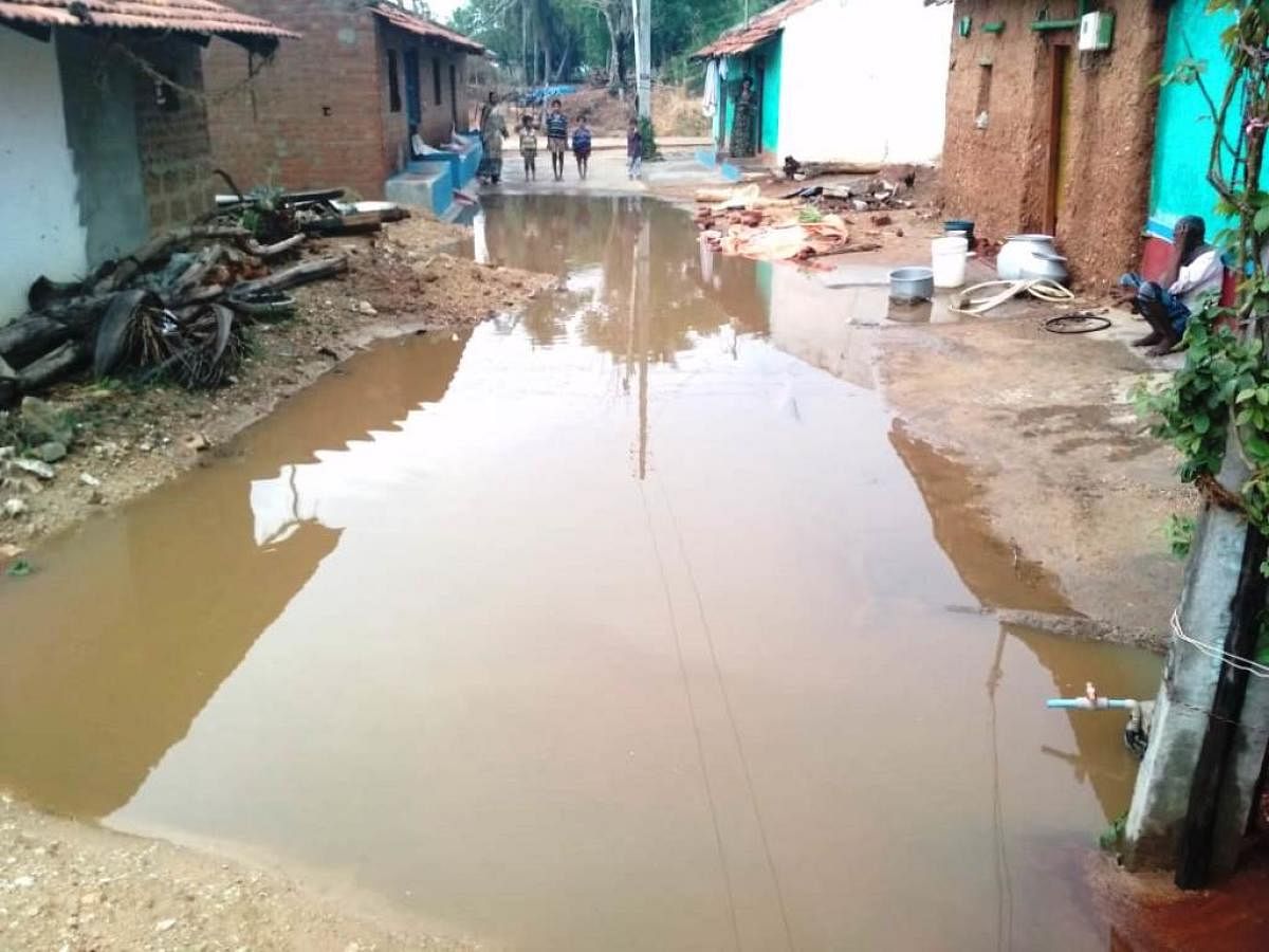 Stagnant rainwater in front of houses at Nandipura, near Ajjampura.