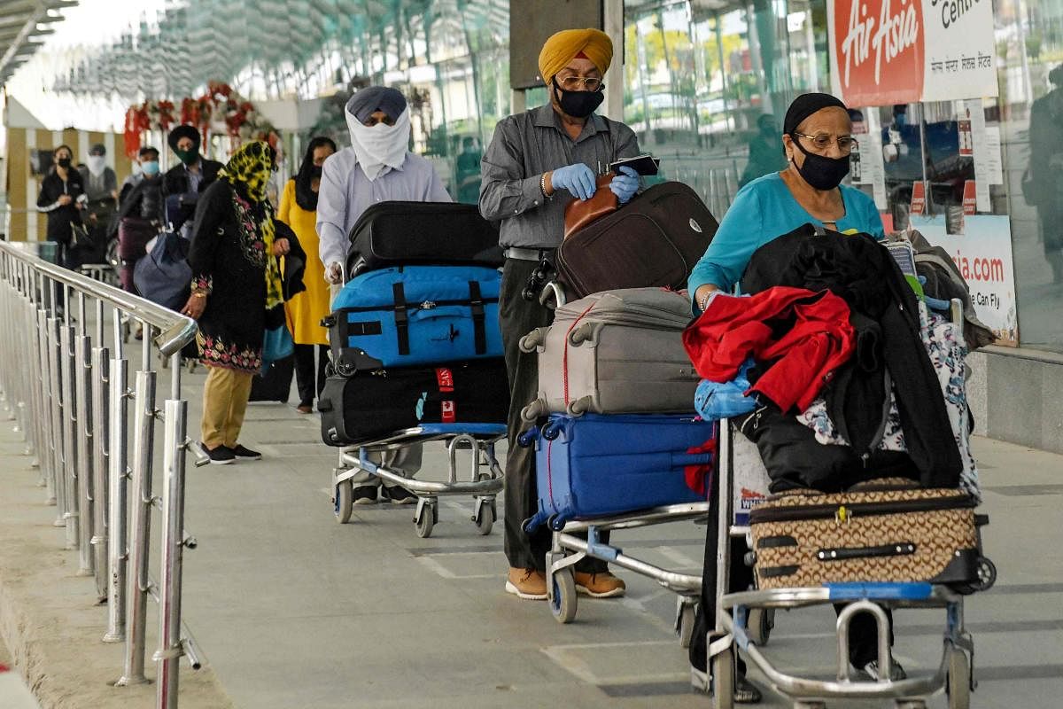 Passengers in Delhi Airport (AFP Photo)