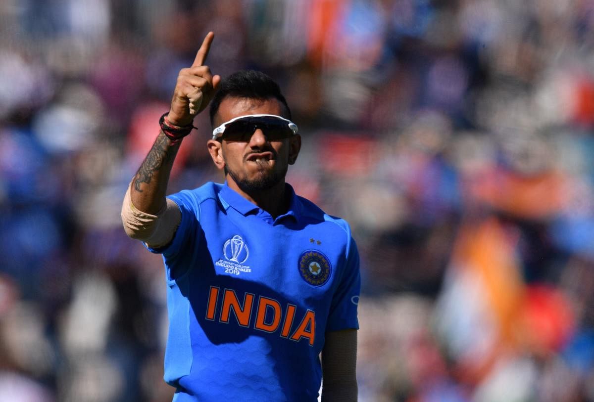 India's Yuzvendra Chahal gestures as he celebrates taking a catch during the 2019 Cricket World Cup group stage match between India and Afghanistan at the Rose Bowl in Southampton, southern England, on June 22, 2019. Credit: AFP Photo
