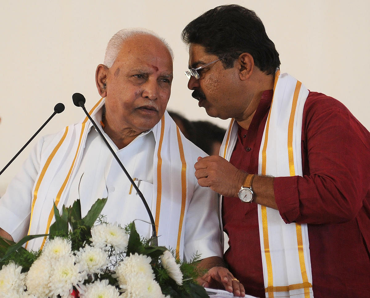 Karnataka Revenue Minister R Ashok and Chief Minister BS Yediyurappa (DH File Photo)