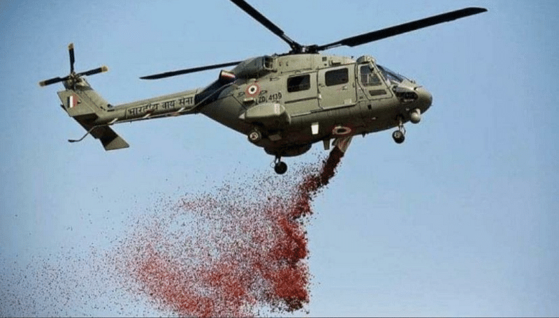 Helicopter showering flower petals
