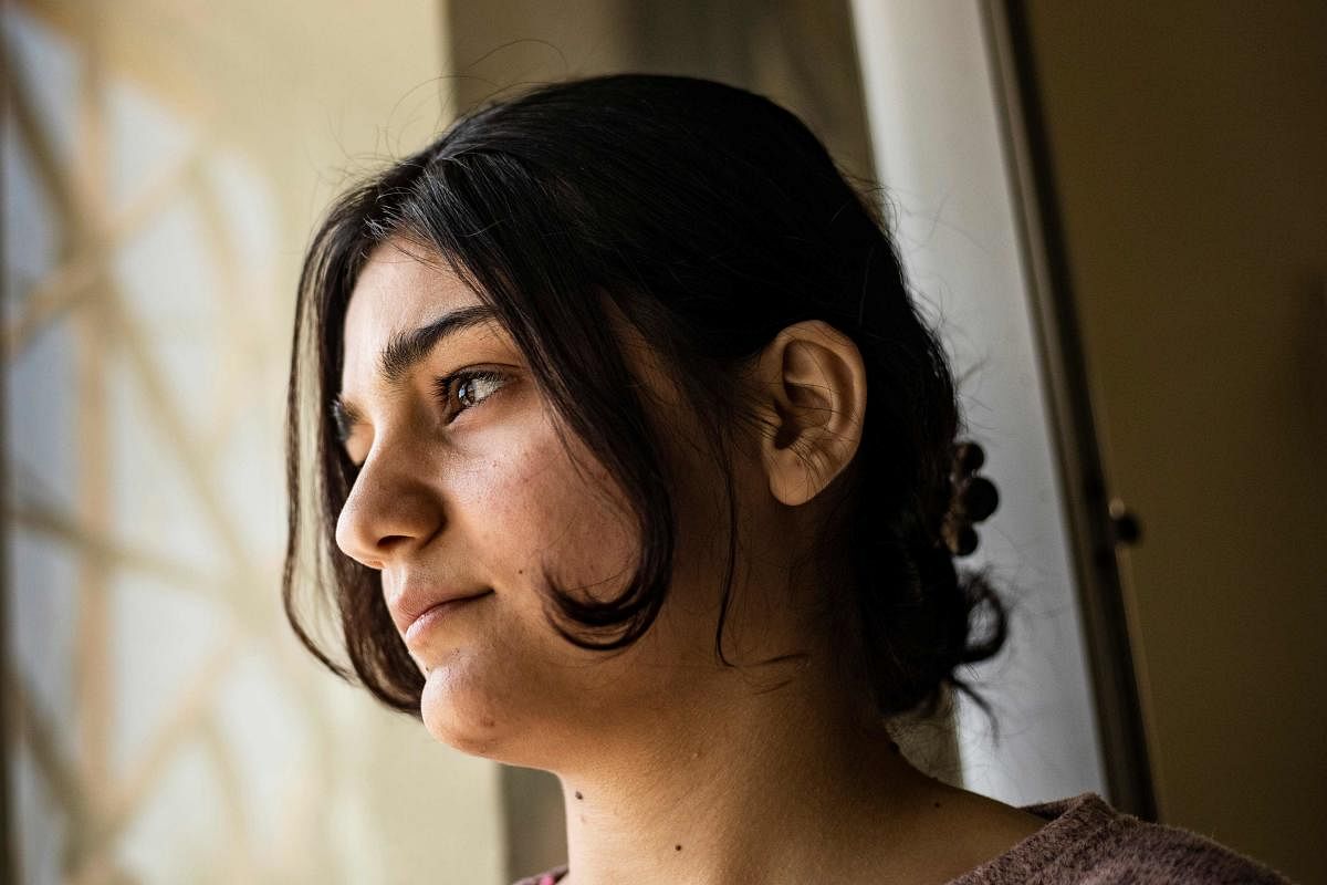 Layla Eido, a teenager from Iraq's minority Yazidi community, is pictured in the countryside of Syria's northeastern province of Hasakeh on April 23, 2020. Credit: AFP Photo