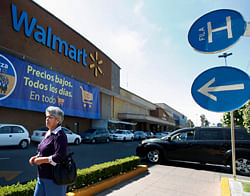 A general view shows a Wal-Mart store in Mexico City, in this April 24, 2012 file picture. Wal-Mart Stores Inc's Mexican affiliate routinely used bribes to open stores in desirable locations, according to a New York Times investigation published December 17, 2012, which cites 19 instances of the retail giant paying off local officials. The banner reads, 'Low prices, every day, in everything'. REUTERS