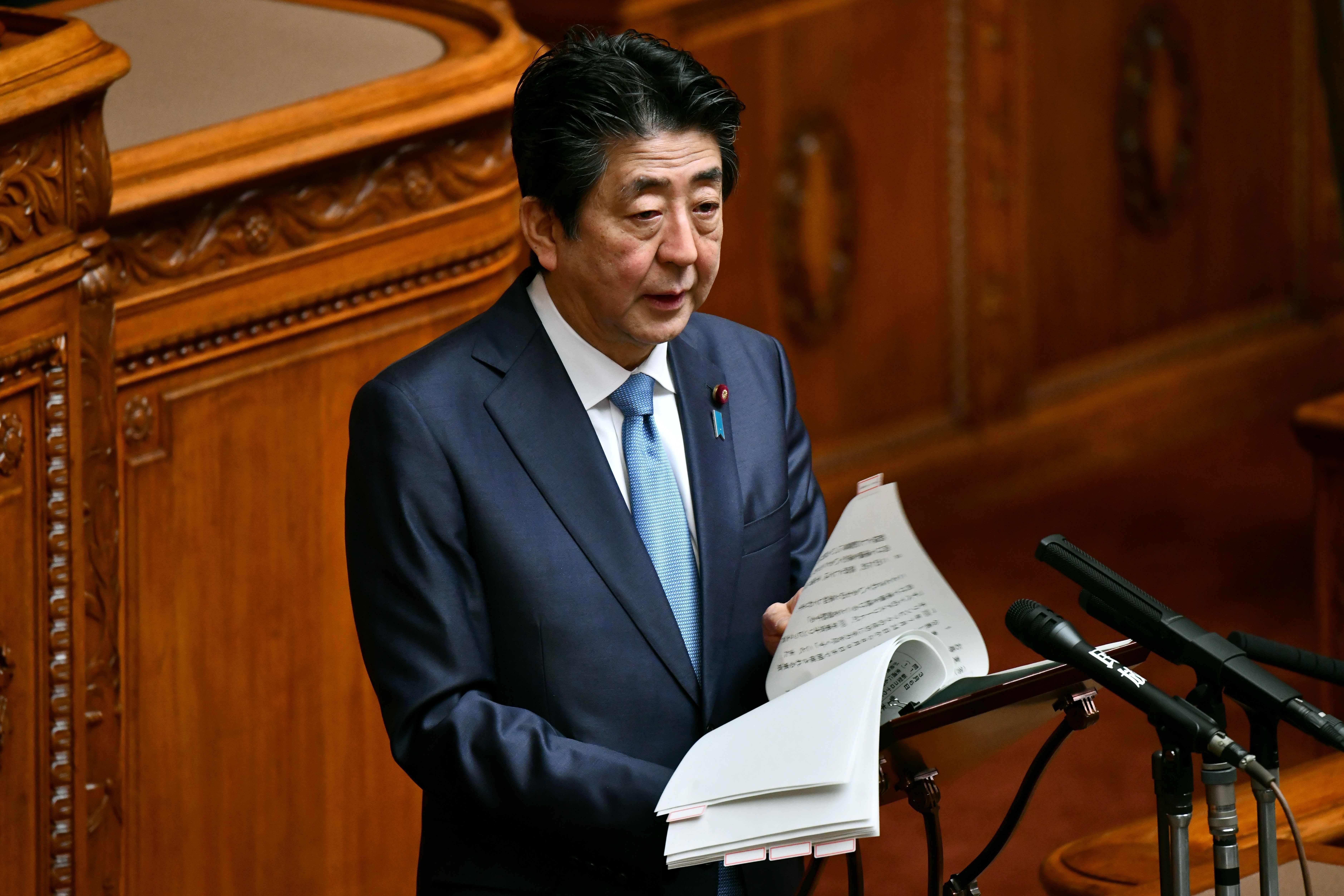 Japan's Prime Minister Shinzo Abe answers questios during a upper house plenary session at parliament in Tokyo, (Credit: AFP)