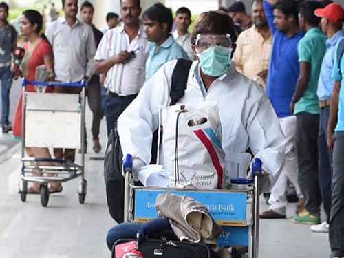 A man suspected of carrying Ebola virus being taken to RML Hospital from IGI Terminal in New Delhi. The Health Ministry today said 821 passengers were being tracked for Ebola in the country with most of them belonging to states of Maharashtra, Kerala and Tamil Nadu. PTI photo