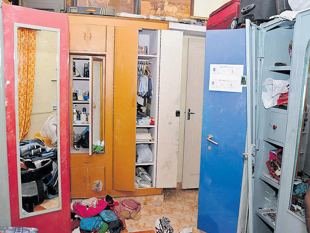 Almirahs and cupboards that were ransacked by the burglars at a house belonging to R Sridhar, Assistant Commissioner of Commercial Tax, at V&#8200;V&#8200;Mohalla in Mysuru on Thursday night.