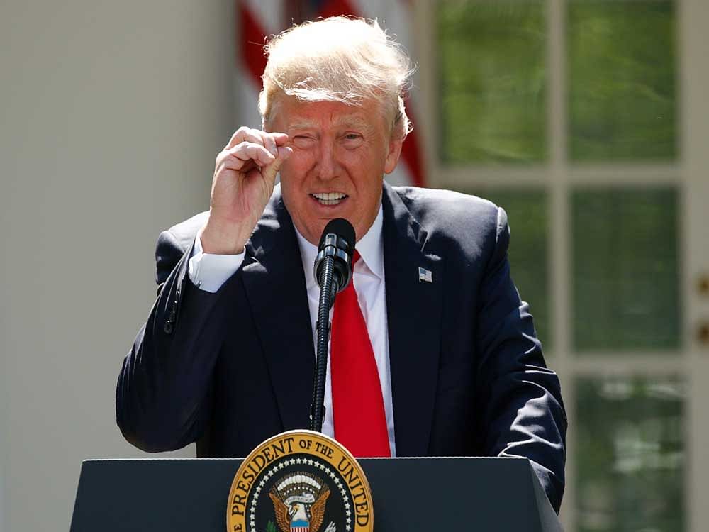 'In order to fulfil my solemn duty to protect our citizens, the United States will withdraw from the Paris Climate Accord... We are getting out and we will start to renegotiate,' Trump said at the Rose Garden of the White House. Reuters photo