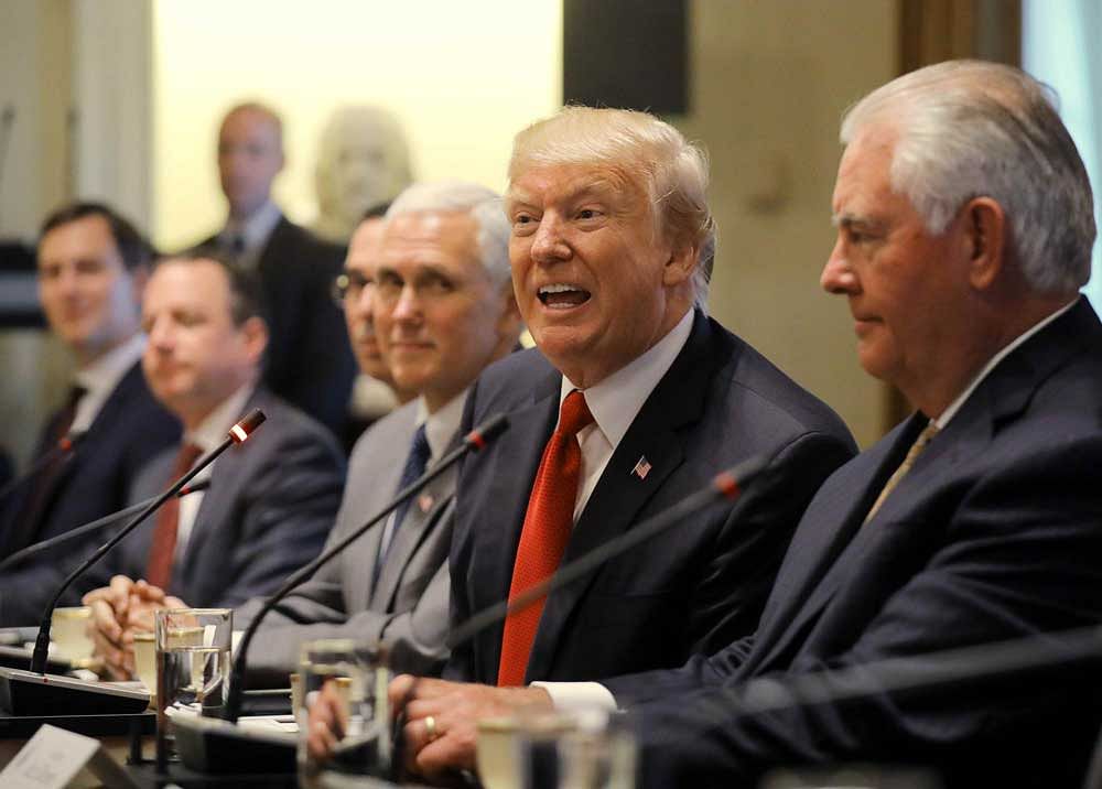 U.S. President Donald Trump speaks flanked by (L-R) Senior Advisor Jared Kushner, Chief of Staff Reince Priebus, Treasury Secretary Steven Mnuchin, Vice President Mike Pence and Secretary of State Rex Tillerson (R) as he meets with India's Prime Minister Narendra Modi in the Cabinet Room of the White House in Washington, U.S., June 26, 2017. REUTERS