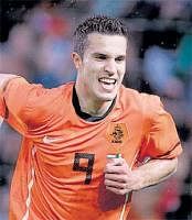 Enforcer: Hollands Robin van Persie celebrates after scoring against Mexico in a World Cup friendly on Wednesday. AP