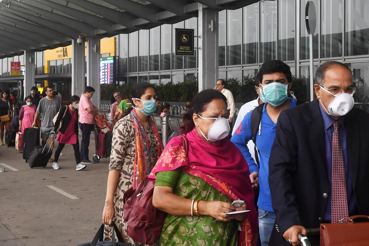 Passengers wearing facemasks as a preventive measure against the spread of the COVID-19 coronavirus outbreak. (AFP Photot)