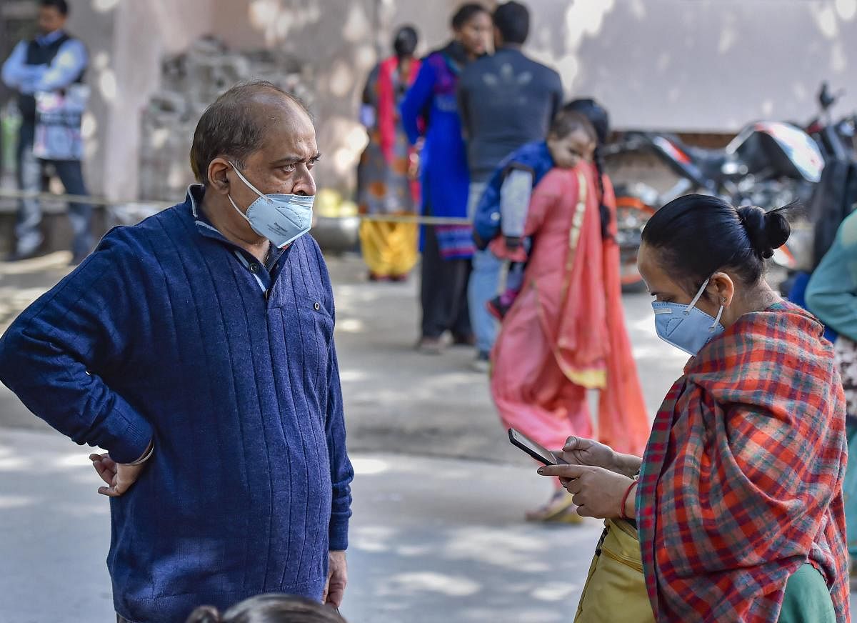 People wearing protective masks in the wake of novel coronavirus or COVID-19 outbreak (PTI Photo)