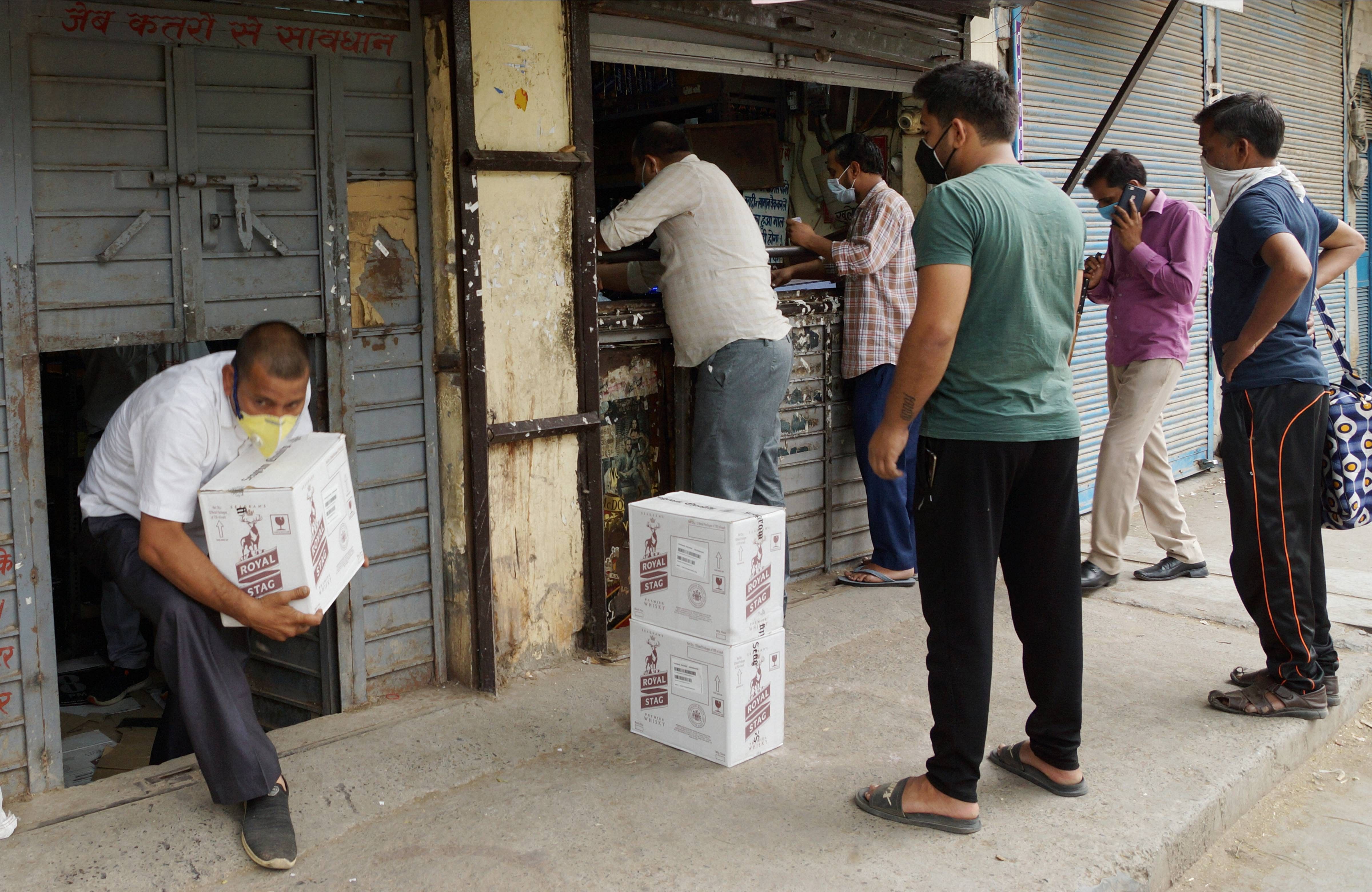 The Delhi government has allowed opening of 150 liquor shops operated by the four corporations. (Credit: PTI Photo)