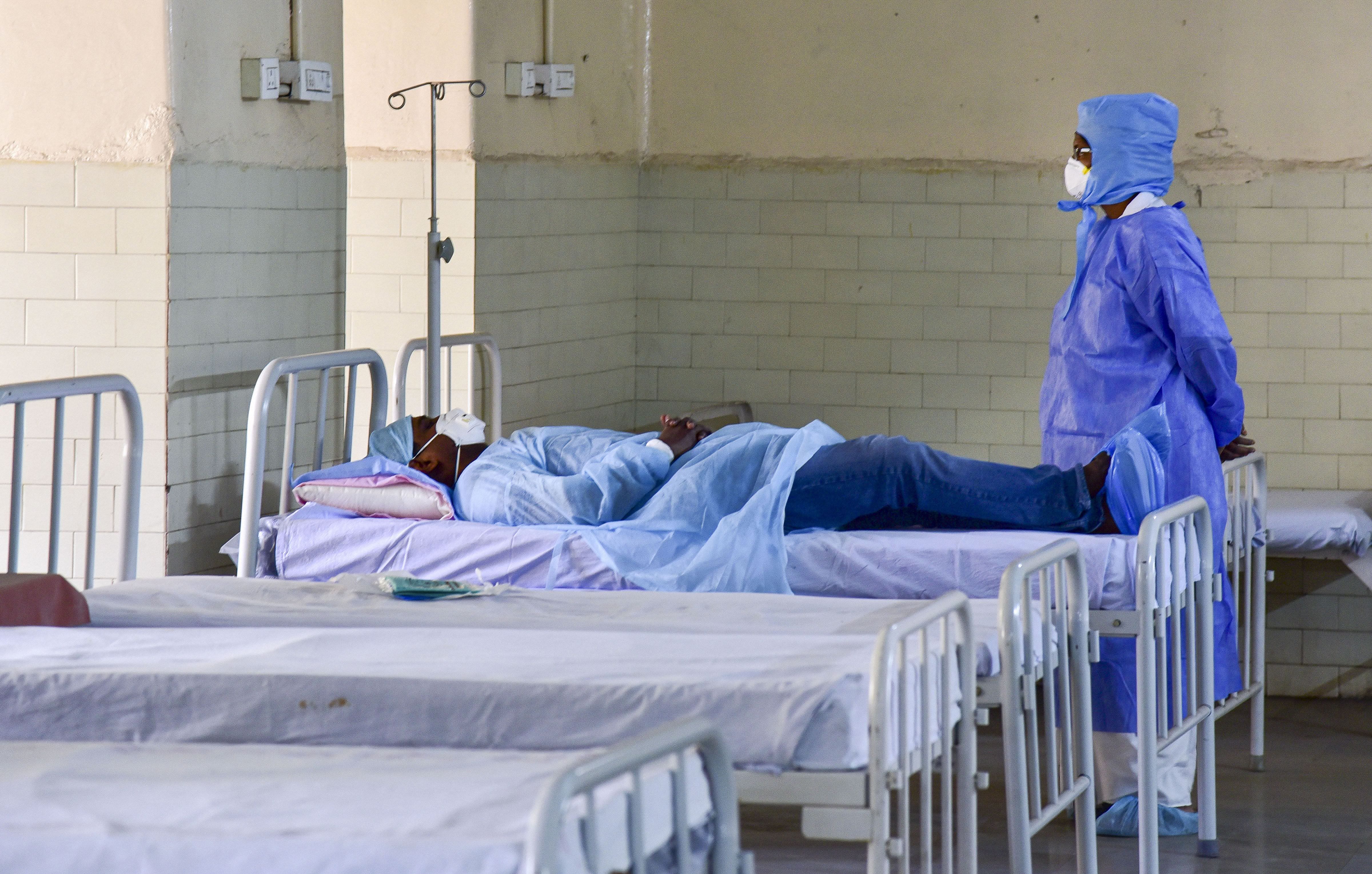 Hyderabad: A medic looks on at a patient who has shown positive symptoms for coronavirus (COVID -19) at an isolation ward in Hyderabad, Tuesday, March 10, 2020. (Credit: PTI Photo)