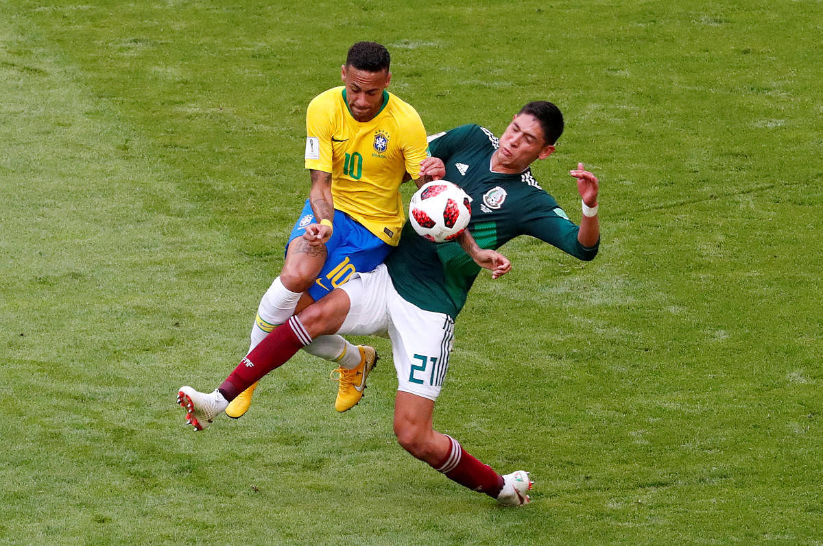 Tournament favourites Brazil took a long time to get going in the face of some hard-working Mexican pressing but went closest to opening the scoring when Neymar and Gabriel Jesus both had shots blocked by keeper Guillermo Ochoa. Reuters photo.