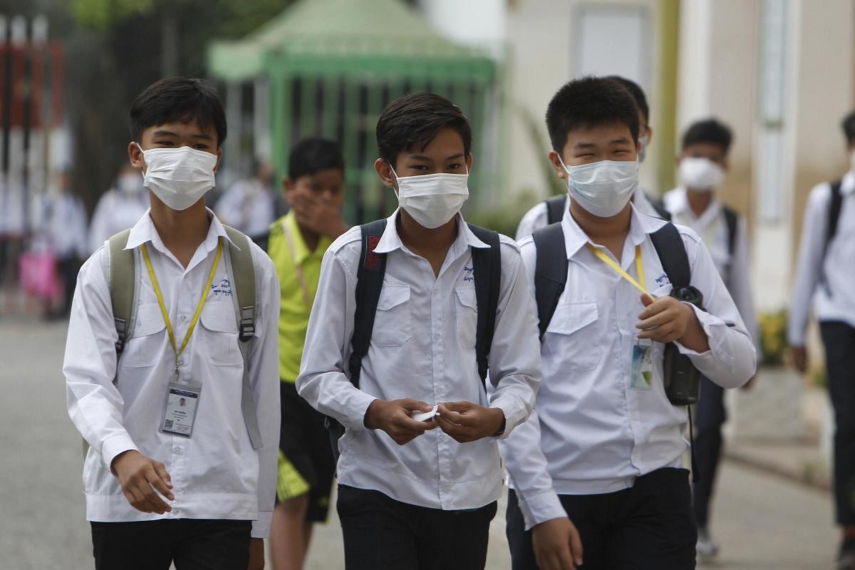 In China, the toll taken by the new virus jumped to 106 dead, and more than 4,000 confirmed cases, according to the latest official report. (AP Photo)