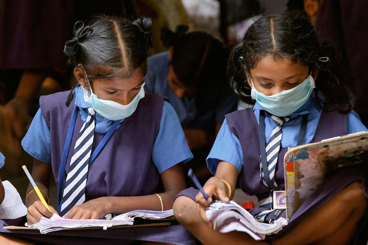 Students wear masks to mitigate the spread of coronavirus. (PTI File Photo)