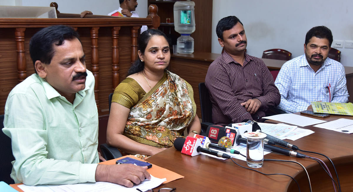 DHO Dr Ramakrishna Rao speaks to reporters in Mangaluru on Friday.