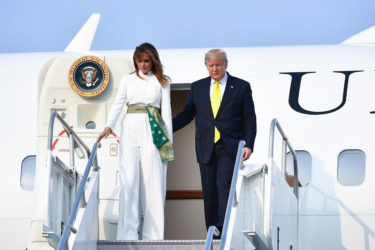 US President Donald Trump and First Lady Melania Trump disembark from Air Force One upon their arrival at Agra Air Base in Agra on February 24, 2020. (Photo by AFP)