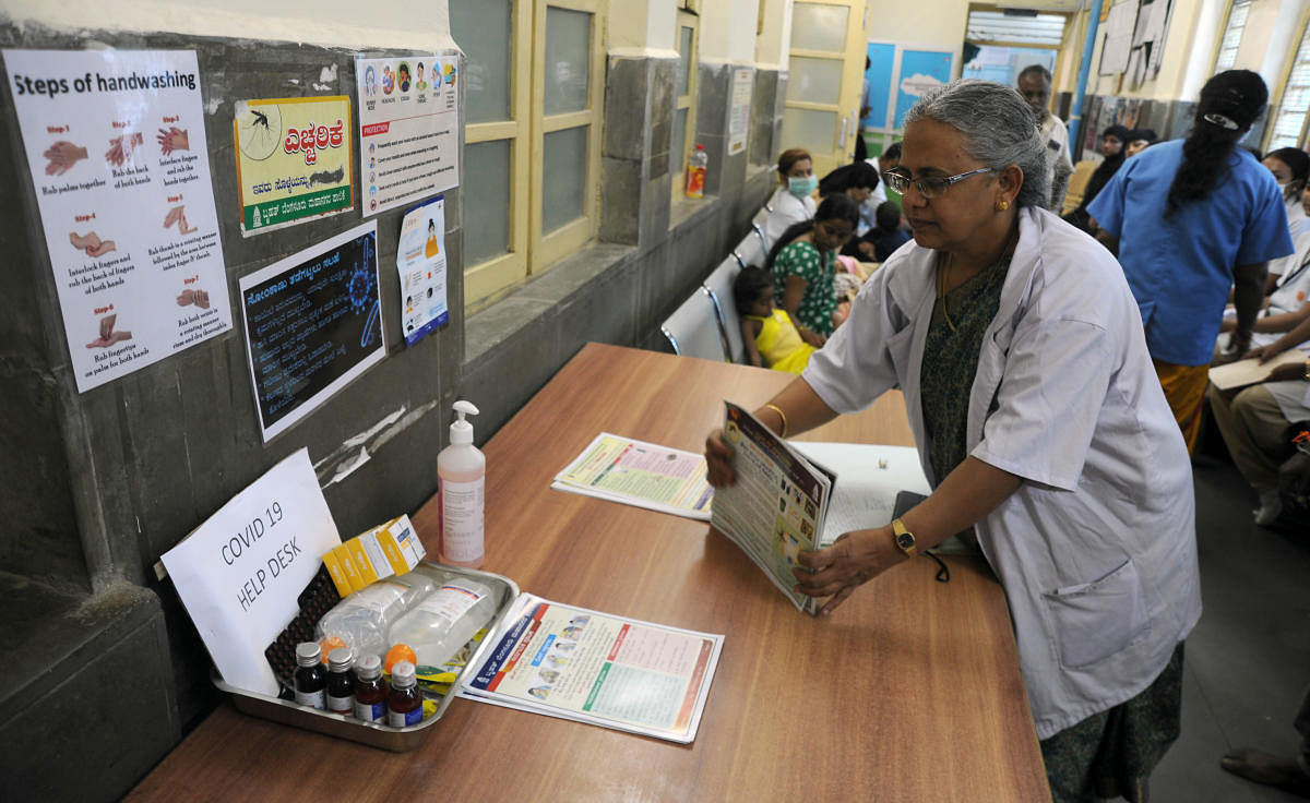 A Covid-19 helpdesk set up at government hospital in Bengaluru on Friday. DH Photo/Pushkar V