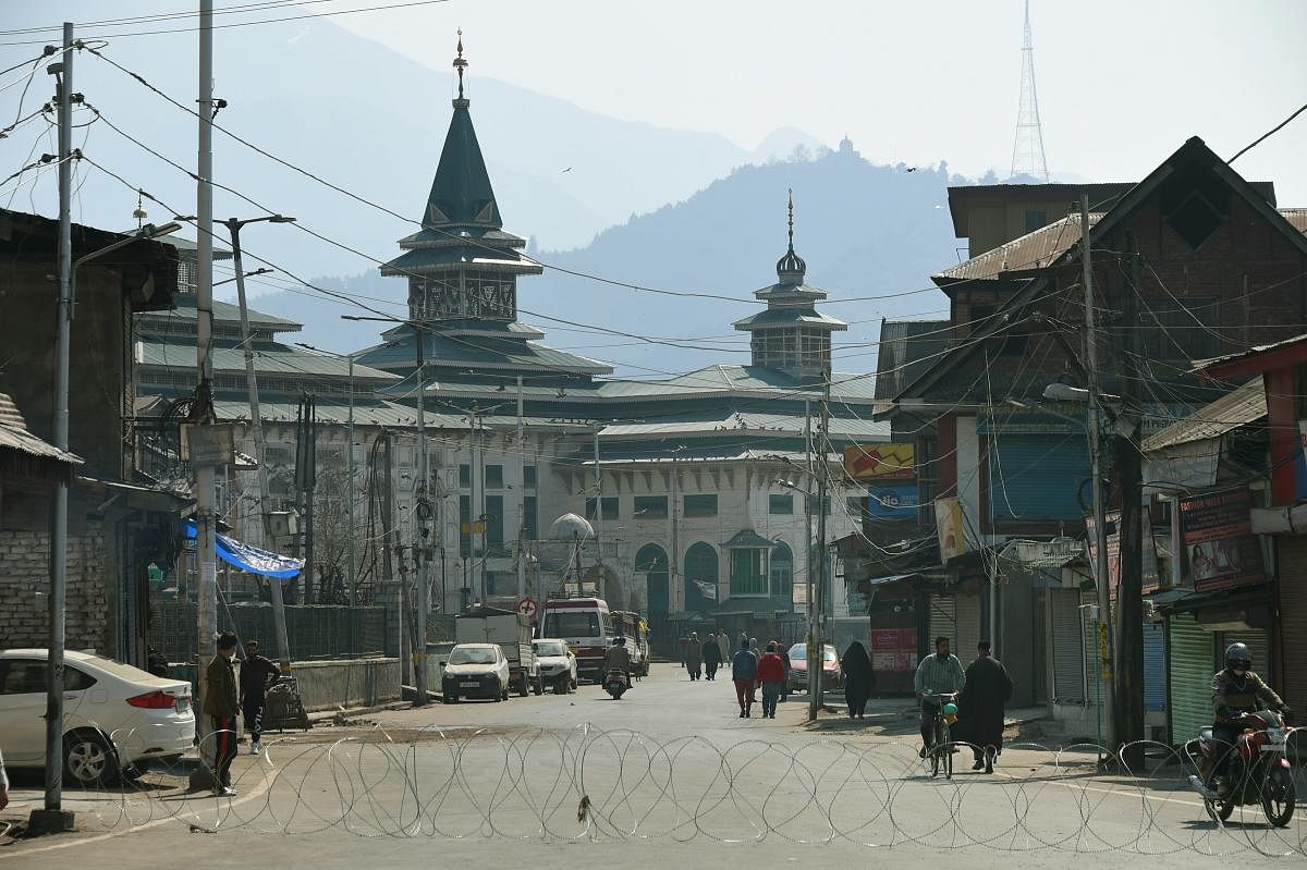 A view of near deserted Jamia Masjid during restrictions in Srinagar, Friday, March 20, 2020. Authorities imposed restrictions on second day as a precautionary measures after first case of coronavirus was detected in the Valley. (PTI Photo)