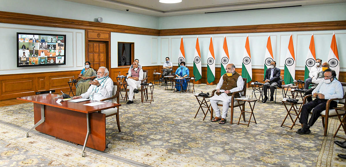 Prime Minister Narendra Modi interacts with the Chief Ministers of states via video conferencing to discuss the emerging situation and plan for tackling the COVID-19 pandemic, in New Delhi, Monday, April 27, 2020. (PIB/PTI Photo)