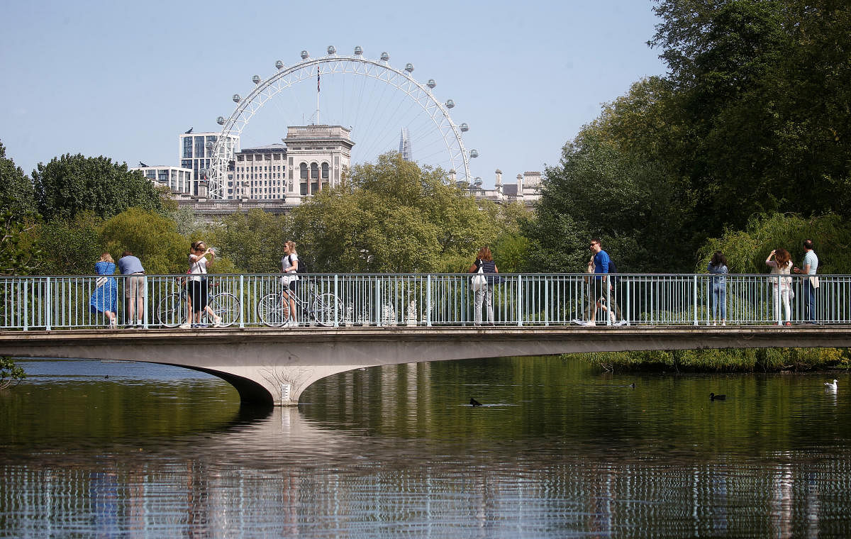 People are seen in St James Park, following the outbreak of the coronavirus disease (COVID-19), London. Reuters