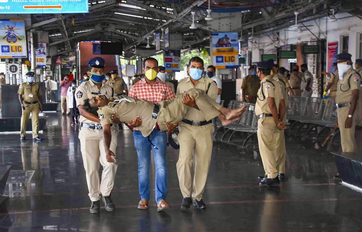 An unconscious police official being taken for treatment to a hospital after a major chemical gas leakage at LG Polymers industry in RR Venkatapuram village. PTI