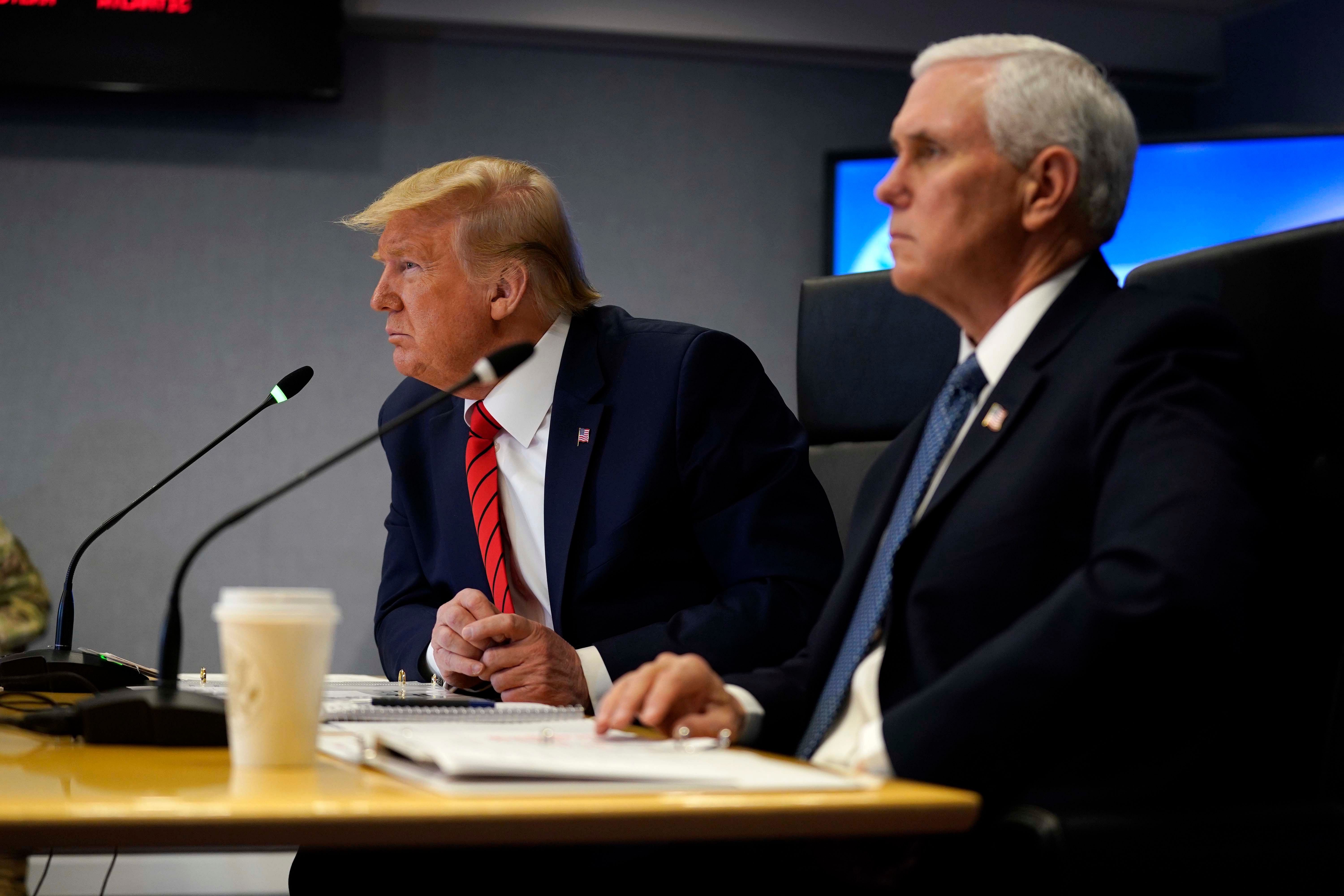 President Donald Trump attends a teleconference with governors at the Federal Emergency Management Agency headquarters. (AP Photo)