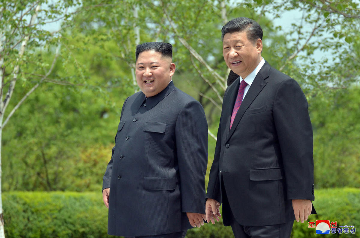 Chinese President Xi Jinping and North Korean leader Kim Jong Un. (Reuters file photo)