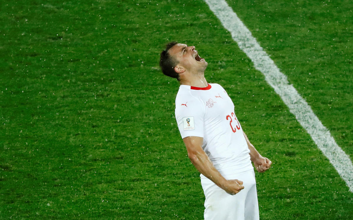 Switzerland's Xherdan Shaqiri celebrates after the match. Reuters photo.