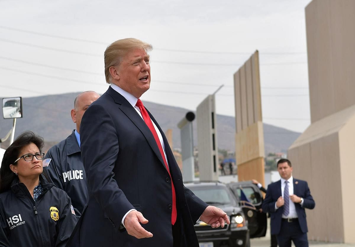 US President Donald Trump inspects border wall prototypes in San Diego, California on March 13, 2018. AFP