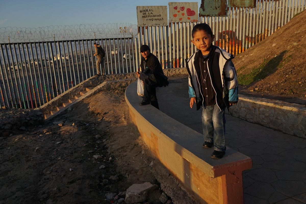 TIJUANA, MEXICO - JANUARY 06: Hector Sanchez, 6, at play along the U.S.-Mexico border wall in the Las Playas area on January 6, 2019 in Tijuana, Mexico. The U.S government is going into the third week of a partial shutdown with Republicans and Democrats a