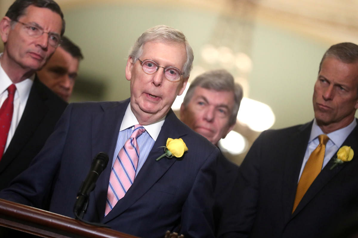 US Senate Majority Leader Mitch McConnell, flanked by Senator John Barrasso, Senator John Thune and Senator Roy Blunt, talks to reporters after the weekly Republican Party caucus lunch meeting at the US Capitol in Washington on June 4, 2019. (REUTERS)