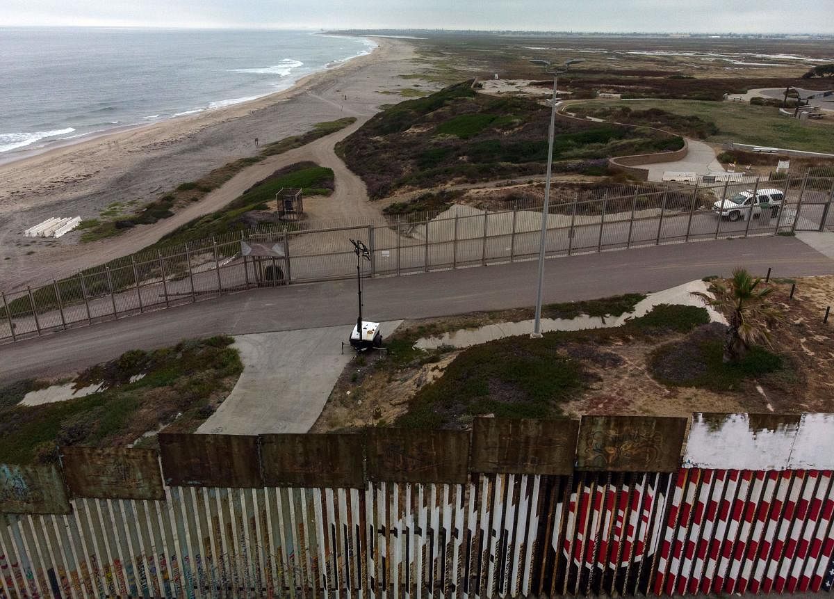 The federal Public Safety Department said on Thursday that the migrants recounted a long, complicated trip in a bid to reach the US border. Aerial view of the US-Mexico border fence in Playas de Tijuana, Baja California state, Mexico on June 10, 2019. Photo/AFP