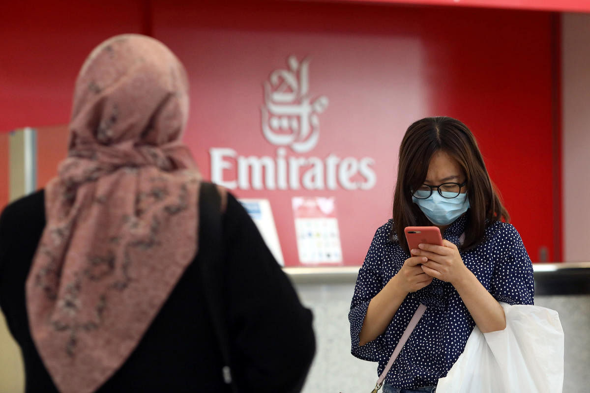 A traveller wears a mask at the Dubai International Airport, after the UAE's Ministry of Health and Community Prevention confirmed the country's first case of coronavirus, in Dubai, United Arab Emirates January 29, 2020. (Reuters photo)