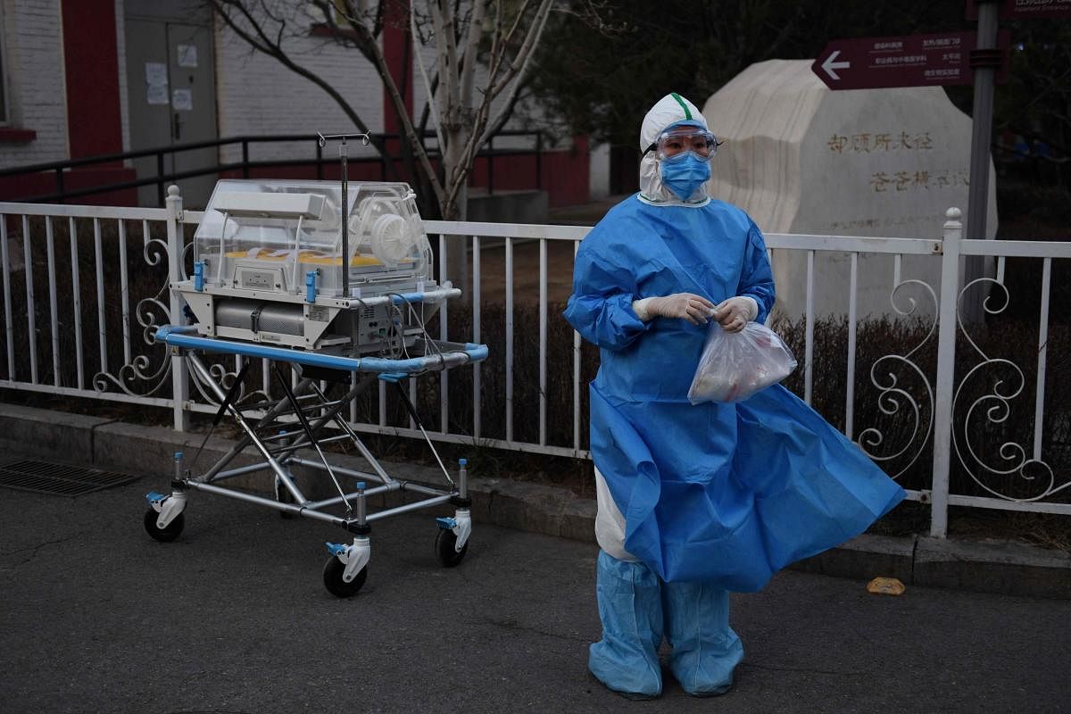 An eruption of new virus cases in South Korea, Iran and Chinese hospitals and prisons rekindled concerns on February 21 about the spread of a deadly disease that has killed more than 2,200 people. (Photo by AFP)