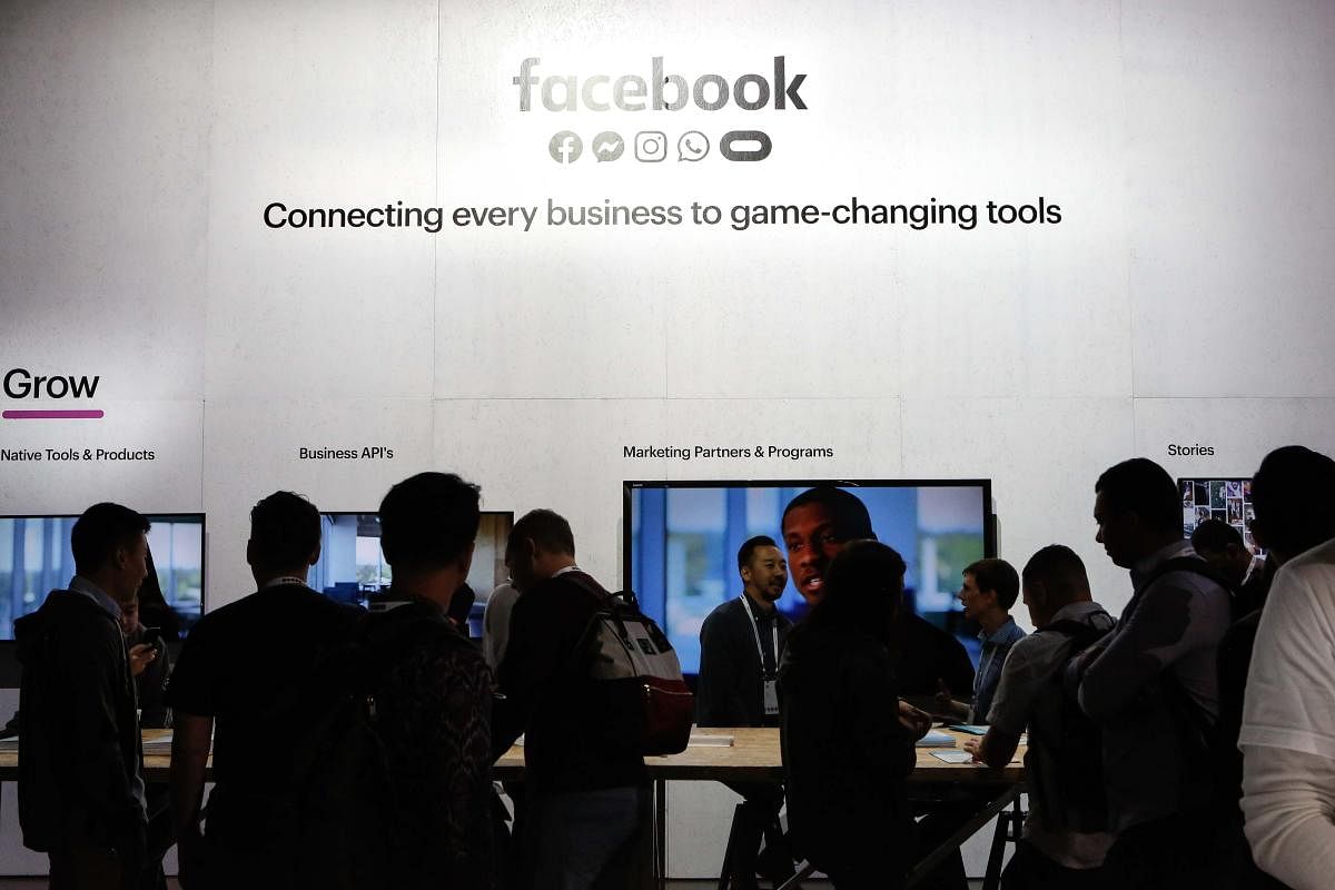 In this file photo taken on April 30, 2019 People attend the Facebook F8 Conference at McEnery Convention Center in San Jose, California. - Facebook on February 27, 2020 canceled its annual F8 developers conference, the biggest annual event for the US tec