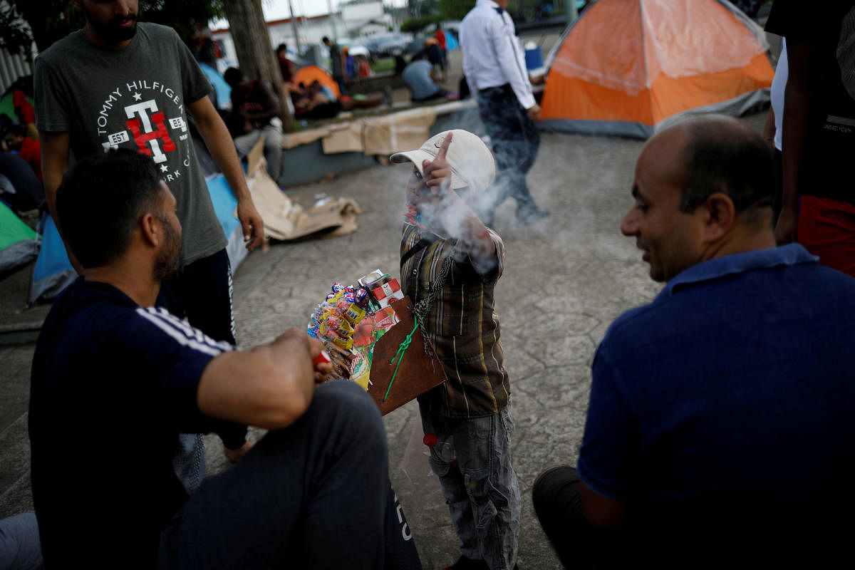  Migrants from India outside of Siglo XXI migration facility (Reuters Photo)
