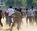 Police lathicharge cricket fans after a chaos during the sale of tickets for the World Cup match between India and South Africa, outside the Vidhrbha Cricket ground in Nagpur on Tuesday. PTI