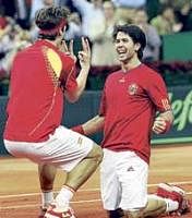 Spains Feliciano Lopez (left) and Fernando Verdasco celebrate their doubles win over Czech Republics Tomas Berdych and Radek Stepanek on Saturday. AFP