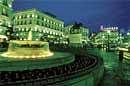 THE PRETTY PART:  Fountain in front of Puerta Del Sol at night, Madrid, Spain