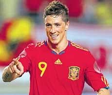 IM BACK:  Spain's Fernando Torres celebrates after scoring against Poland in a World Cup warm-up match. AFP