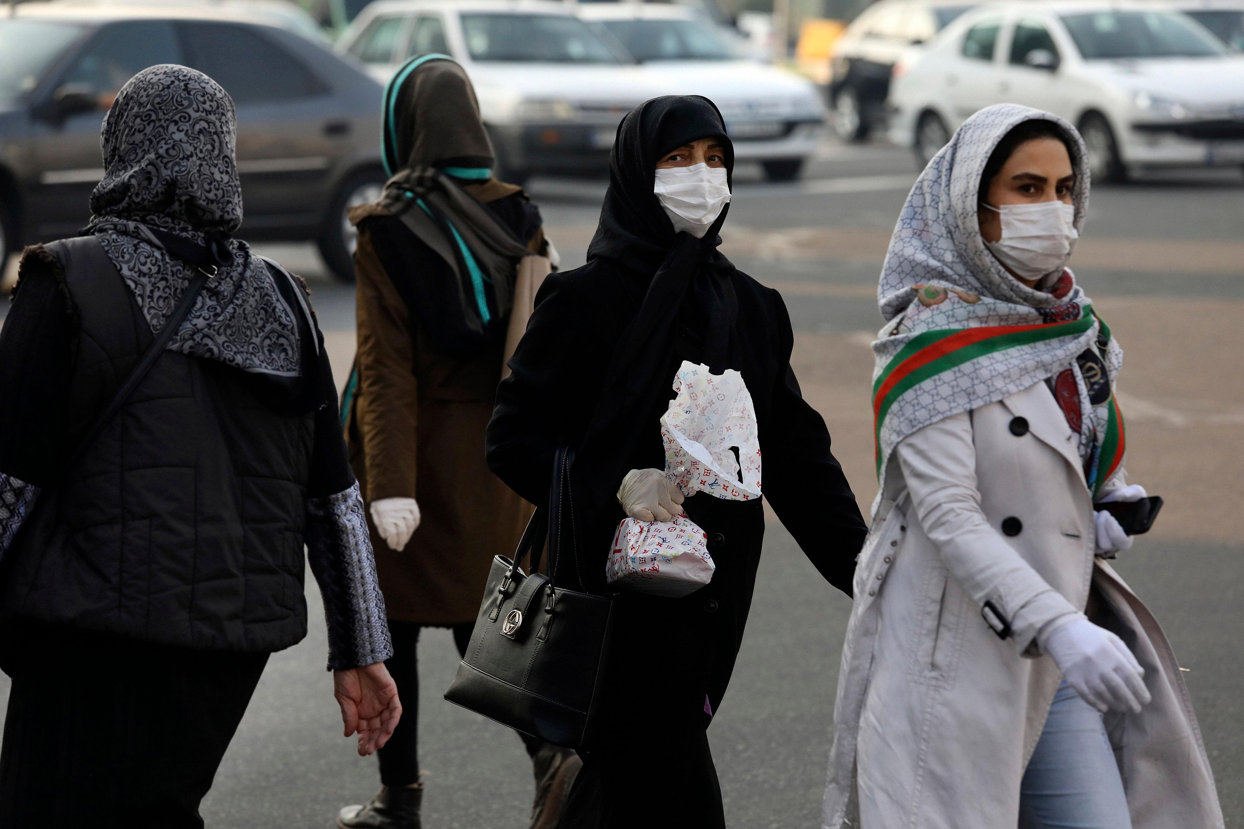 Azerbaijan, Iraq, Canada, Georgia, Lebanon, New Zealand and Qatar have now confirmed coronavirus infections among people arriving from Iran. (Credit: AP Photo)