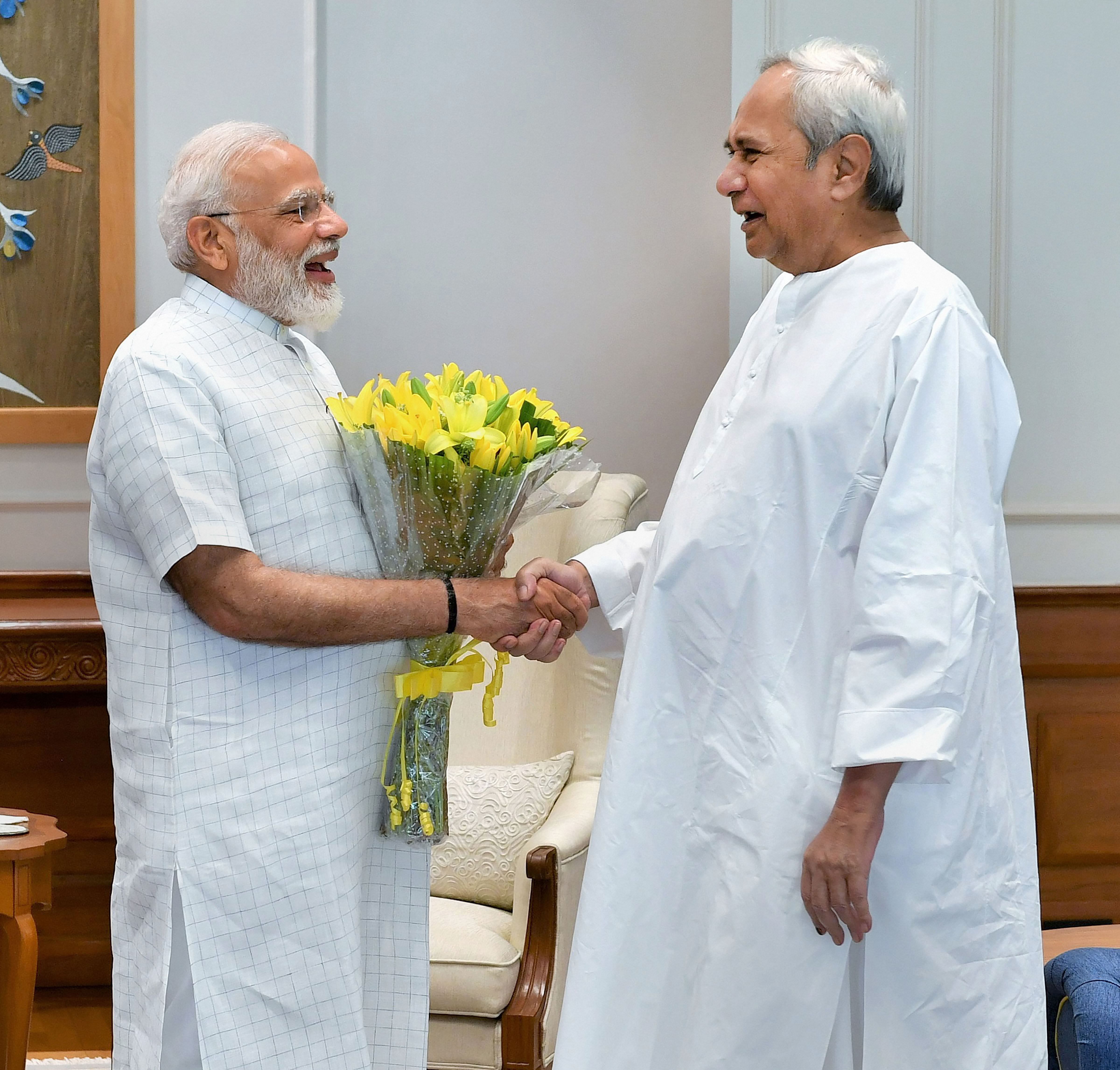 Prime Minister Narendra Modi shakes hands with Odisha Chief Minister Naveen Patnaik during a call on, in New Delhi. (PTI Photo)