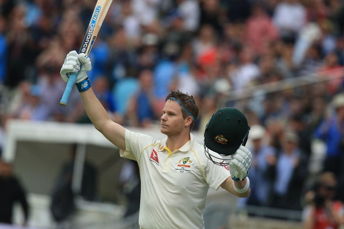 ustralia's Steve Smith acknowledges the crowd as he leaves the field after being bowled by England's Stuart Broad for 144 on the opening day of the first Ashes cricket Test match between England and Australia at Edgbaston in Birmingham. (AFP)